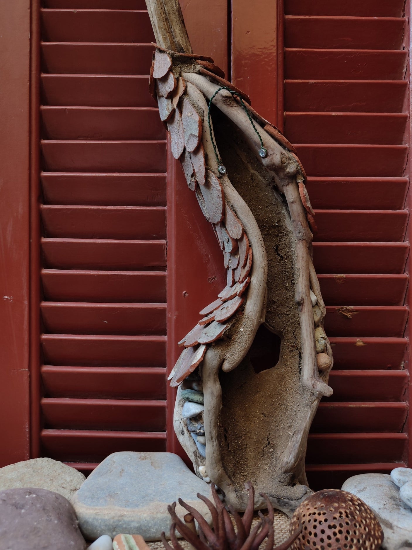 Curvy driftwood house