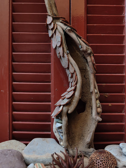 Curvy driftwood house