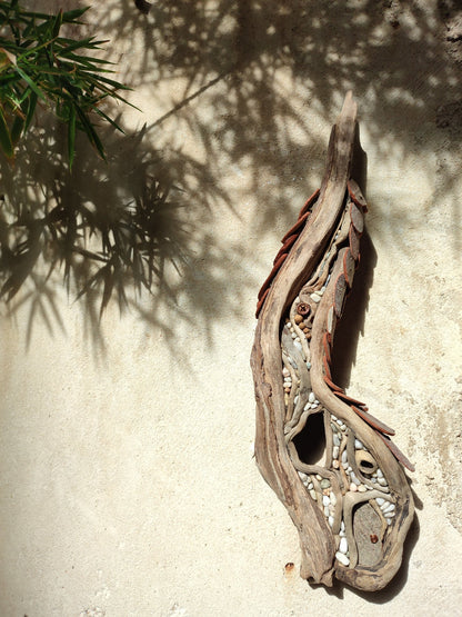 Curvy driftwood house